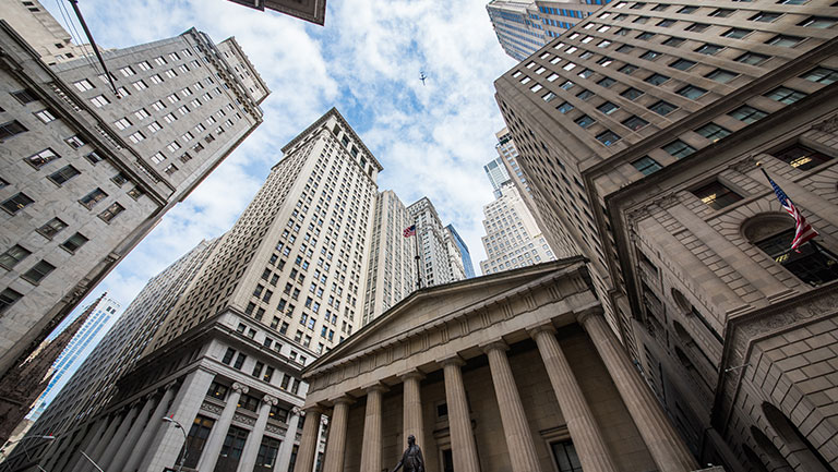 Wall Street looking up towards the sky